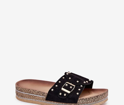 Sandales noires d'inspiration brésilienne avec décorations métalliques dorées, semelle en liège épaisse et détail à boucle, idéales pour un style estival chic et confortable.