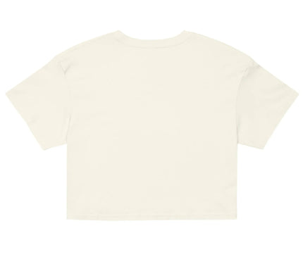 Crop top blanc inspiré des rues animées de Rio de Janeiro, incarnant l'esprit festif et chaleureux du Brésil. Design simple et élégant, parfait pour un style décontracté qui évoque la culture brésilienne et le soleil carioca.