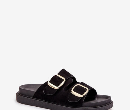 Sandales noires inspirées du Brésil avec larges brides et boucles dorées, reflétant un style chic et décontracté, parfaites pour le confort et l'élégance au quotidien.