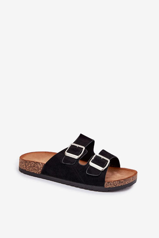Sandales noires inspirées du mode de vie brésilien avec brides ajustables en métal, semelle en liège confortable et design minimaliste, évoquant les plages ensoleillées du Brésil. Idéal pour un style décontracté et élégant.