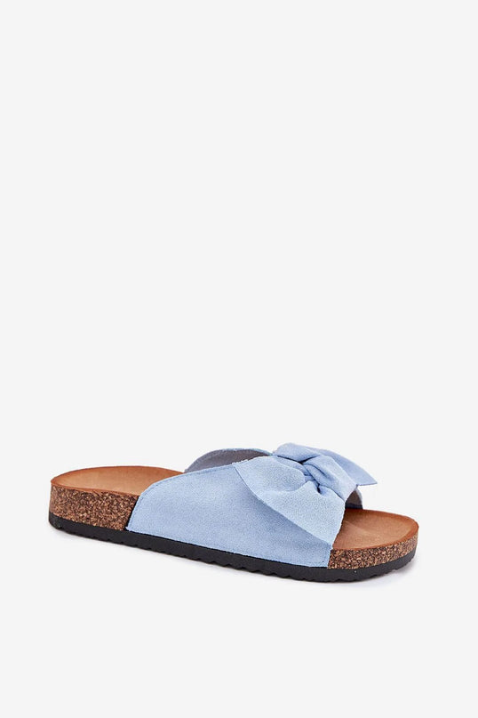 Sandales bleues élégantes avec nœud sur le dessus, semelle en liège et inspiration brésilienne décontractée, parfaites pour les plages et les promenades urbaines, alliant confort et légèreté.