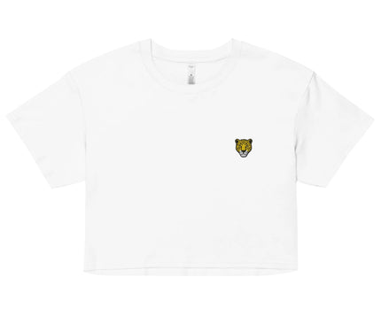 Haut blanc minimaliste avec un motif de tête de jaguar jaune, symbole emblématique de la forêt amazonienne et de la culture brésilienne. Ce design moderne et urbain, inspiré des grandes villes du Brésil comme São Paulo et Rio de Janeiro, représente la puissance et la beauté de la nature brésilienne.