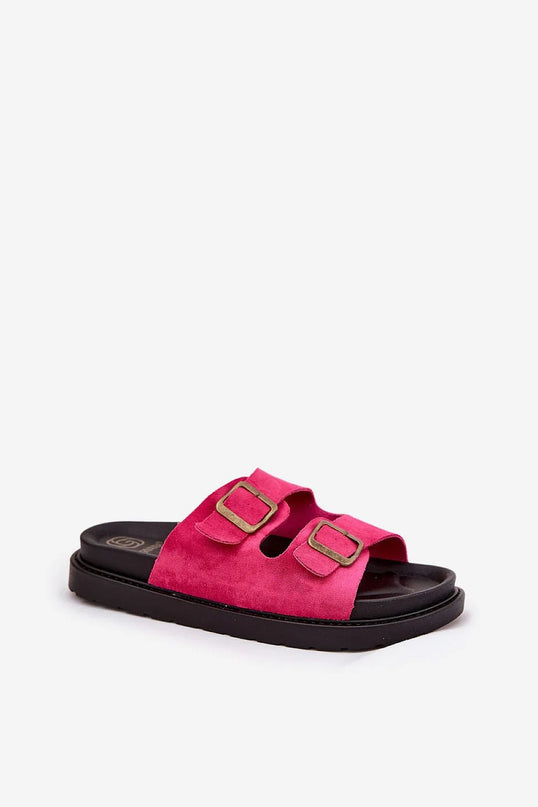 Sandales à double boucle en rose vif, inspirées du style décontracté et vibrant brésilien, avec semelle noire confortable. Idéales pour les plages et les ruelles animées, ces sandales minimalistes et élégantes allient artisanat brésilien et confort pratique.